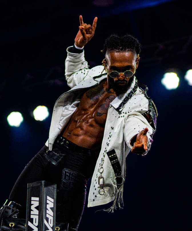 IMPACT Wrestling performer posing at the top of the entrance ramp
